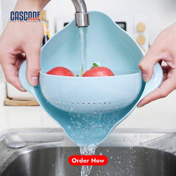 Two-piece light green plastic kitchen set with a perforated colander strainer nested inside a matching larger basin/bowl.